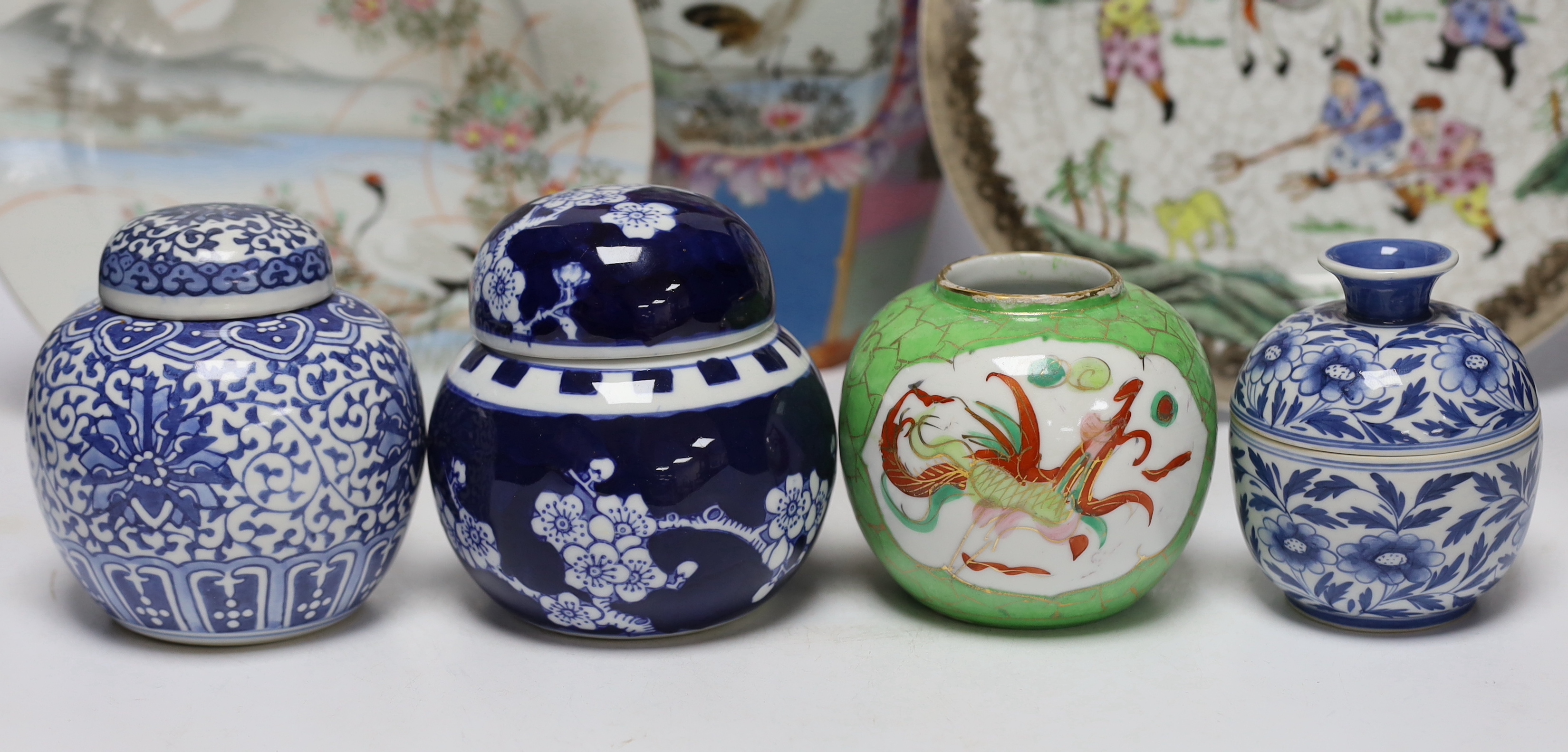 A group of Japanese and Chinese porcelain including an 18th century Chinese export dish, tallest 36cm